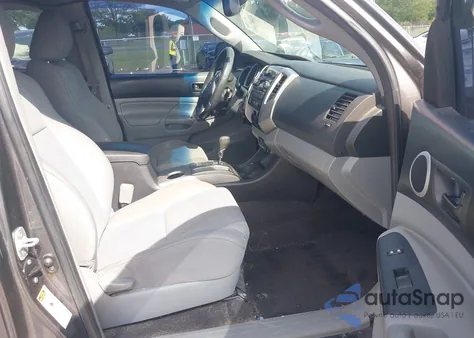 2012 Toyota Tacoma Base V6 z USA, uszkodzony, nr VIN 5TFUU4EN8CX027153